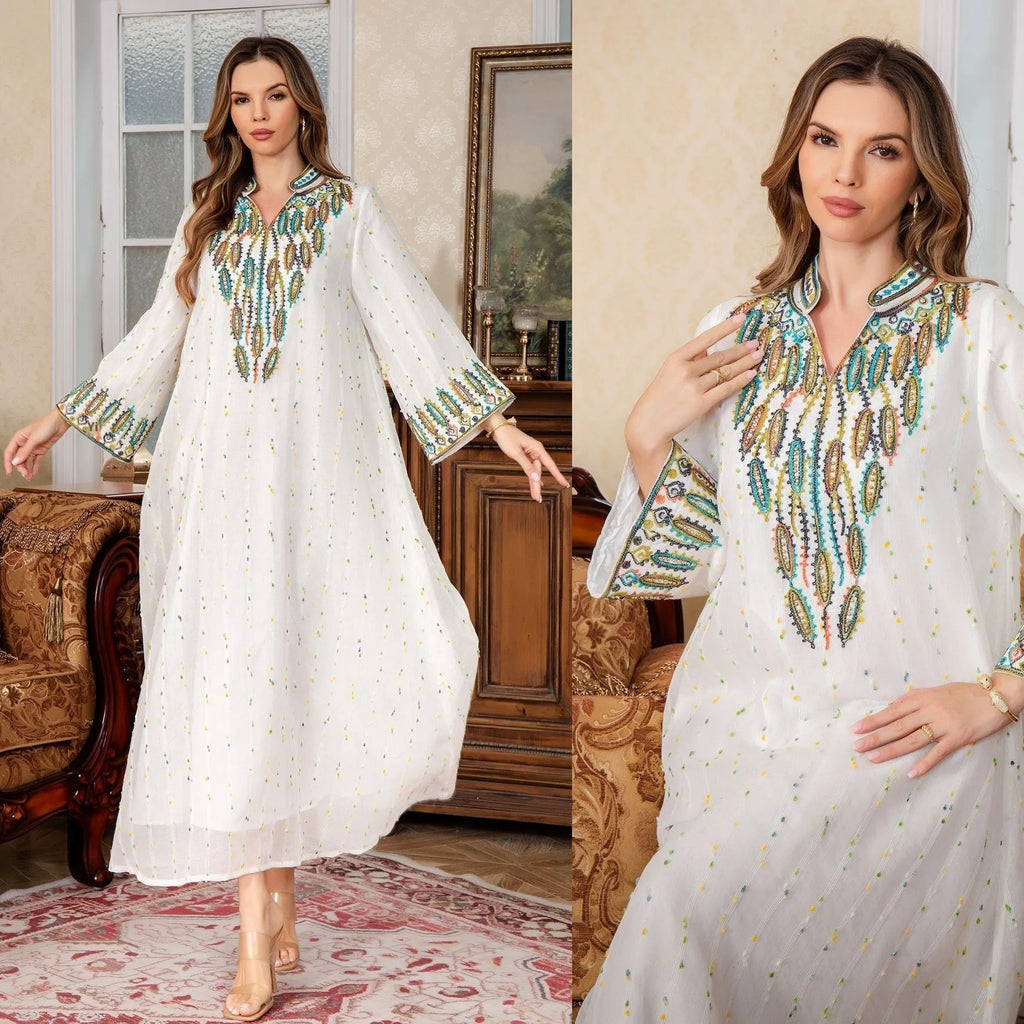 White polyester Arabic robe for women with long sleeves and long skirt.
