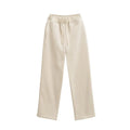 Women's hooded sweater and wide-leg pants set in solid colour polyester blend, beige top and camel trousers
