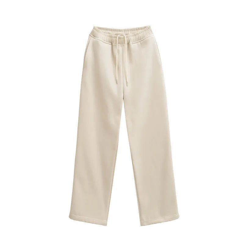 Women's hooded sweater and wide-leg pants set in solid colour polyester blend, beige top and camel trousers