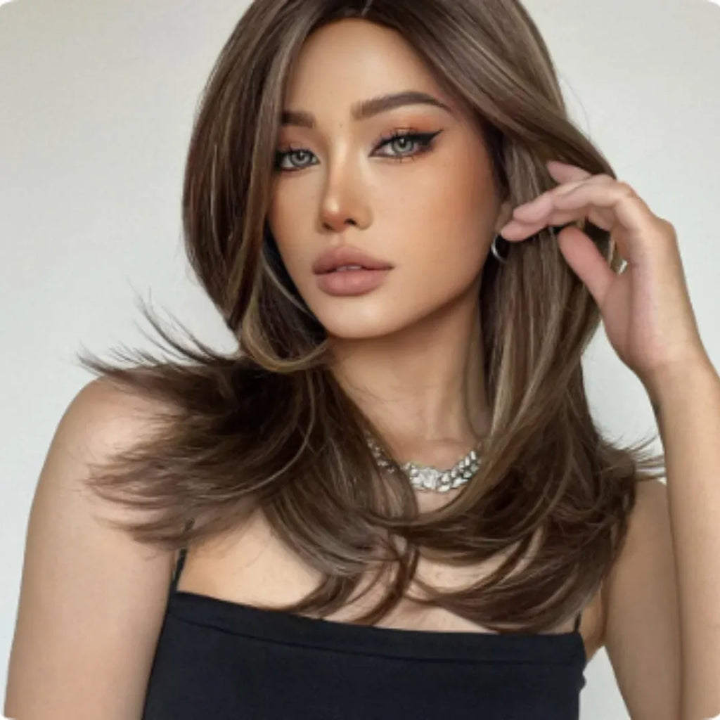 Mid-length curly synthetic wig with gradient colour and long bangs