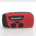Red rechargeable emergency hand radio with torch, built-in speaker, wrist strap, and Type-C charging cable.