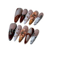 Ten artificial nail stickers with leopard print, cross, and floral patterns in French style design