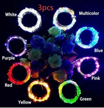 Flexible copper wire LED string light with bottle stopper for wine bottle decoration.