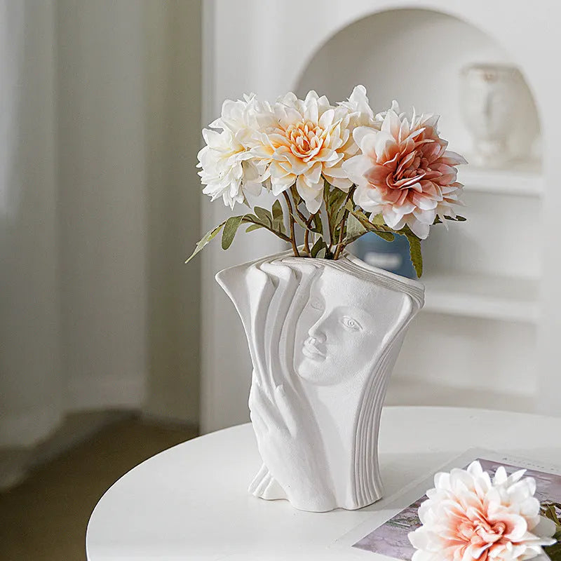 Glazed ceramic book stand in modern simplicity style, shown in one of four colour designs.