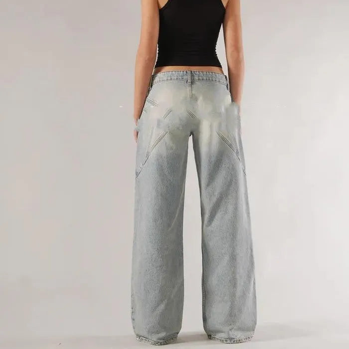 Women's loose fit cotton wide leg trousers in blue with low waist and splicing stitch detail.