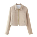 Women's herringbone pattern two-piece suit with embroidered jacket and straight-leg trousers