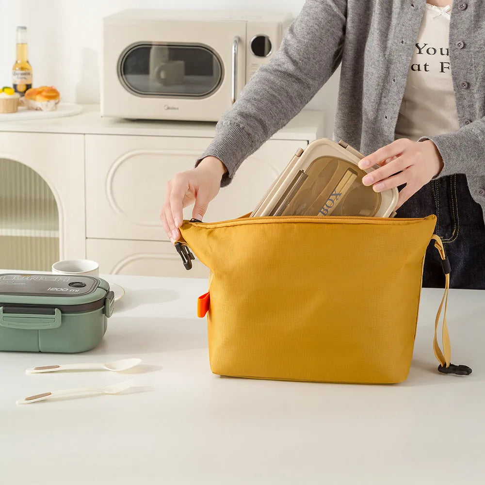 Japanese style insulated lunch bag in Oxford cloth, shown with Army Green, Black, Gray, and Yellow colour options.