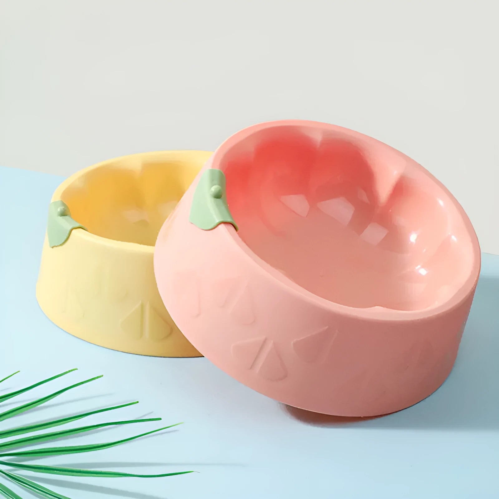 Plastic double pet bowl in blue colour with anti-tipping design for cats and dogs