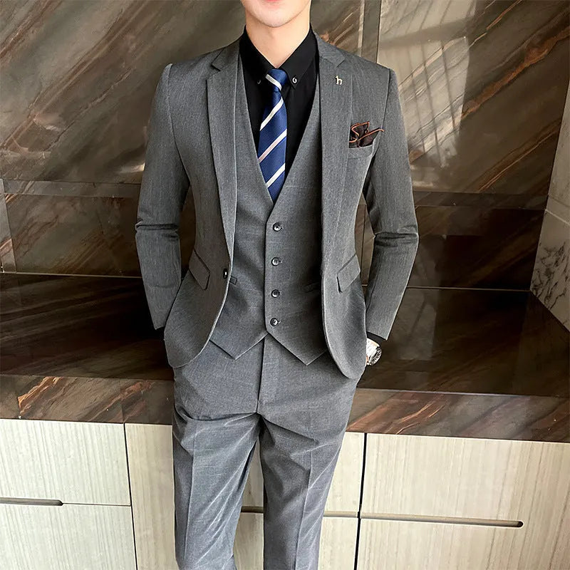 Men's slim fit British style business suit in black and dark grey cotton blend fabric