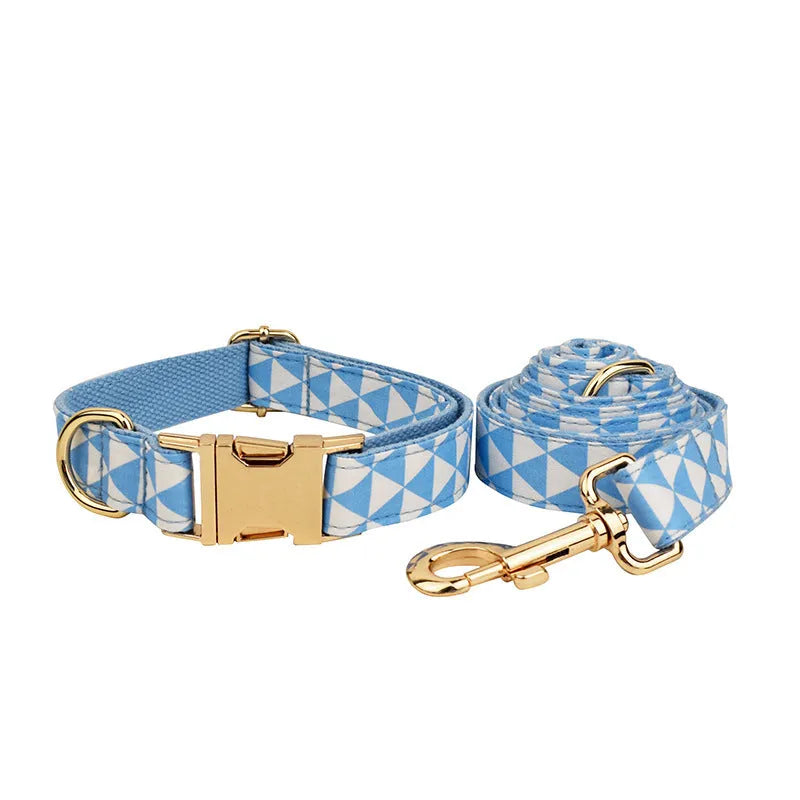Blue cloth dog collar, leash, bow, and vest four-piece pet accessory set shown with size options