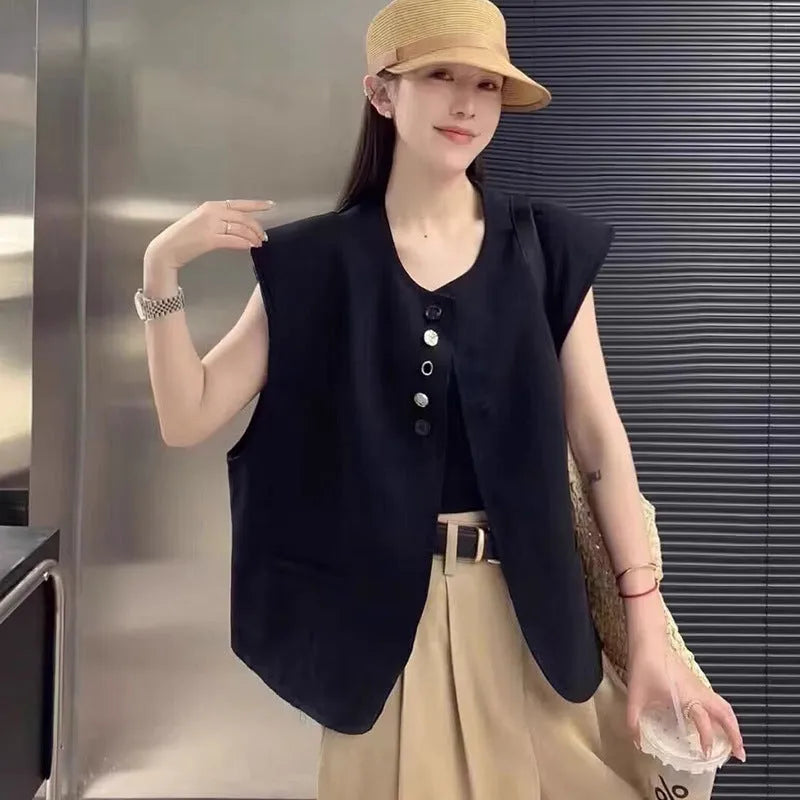 Women's milky white loose-fit polyester vest with pockets, shown with a short 40cm length.