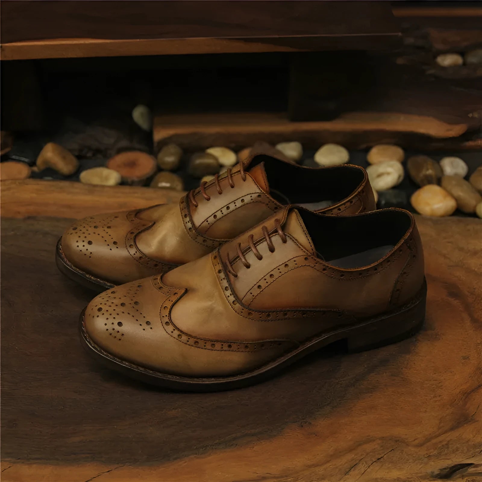Light brown men's vintage engraved leather lace-up shoes with round toe.