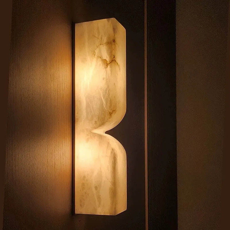 Modern Nordic wall lamp strip with copper construction emitting warm light