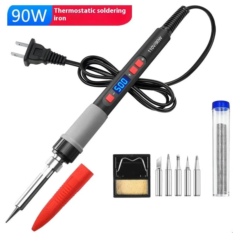 Grey electric soldering iron with ceramic heating core and five soldering tips for household electronics repairs