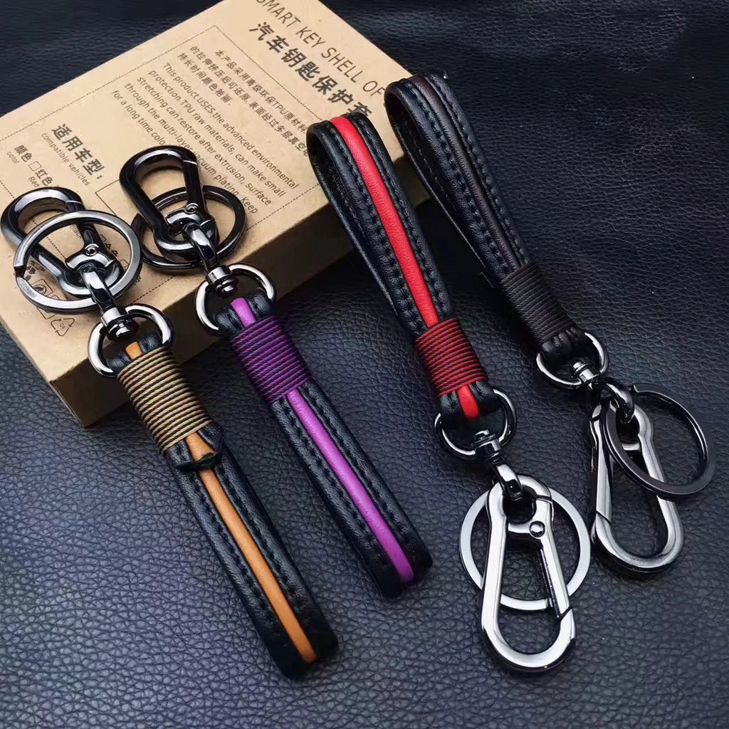 Handmade leather keychain with plastic ring in gun black and red colour option, with key cover