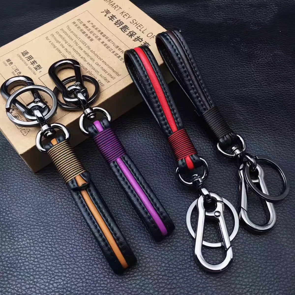 Handmade leather keychain with plastic ring in gun black and red colour option, with key cover