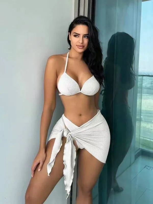 Women's avocado green Russian split three-piece swimsuit set showing halter neck top, high-waist bottoms, and skirt.