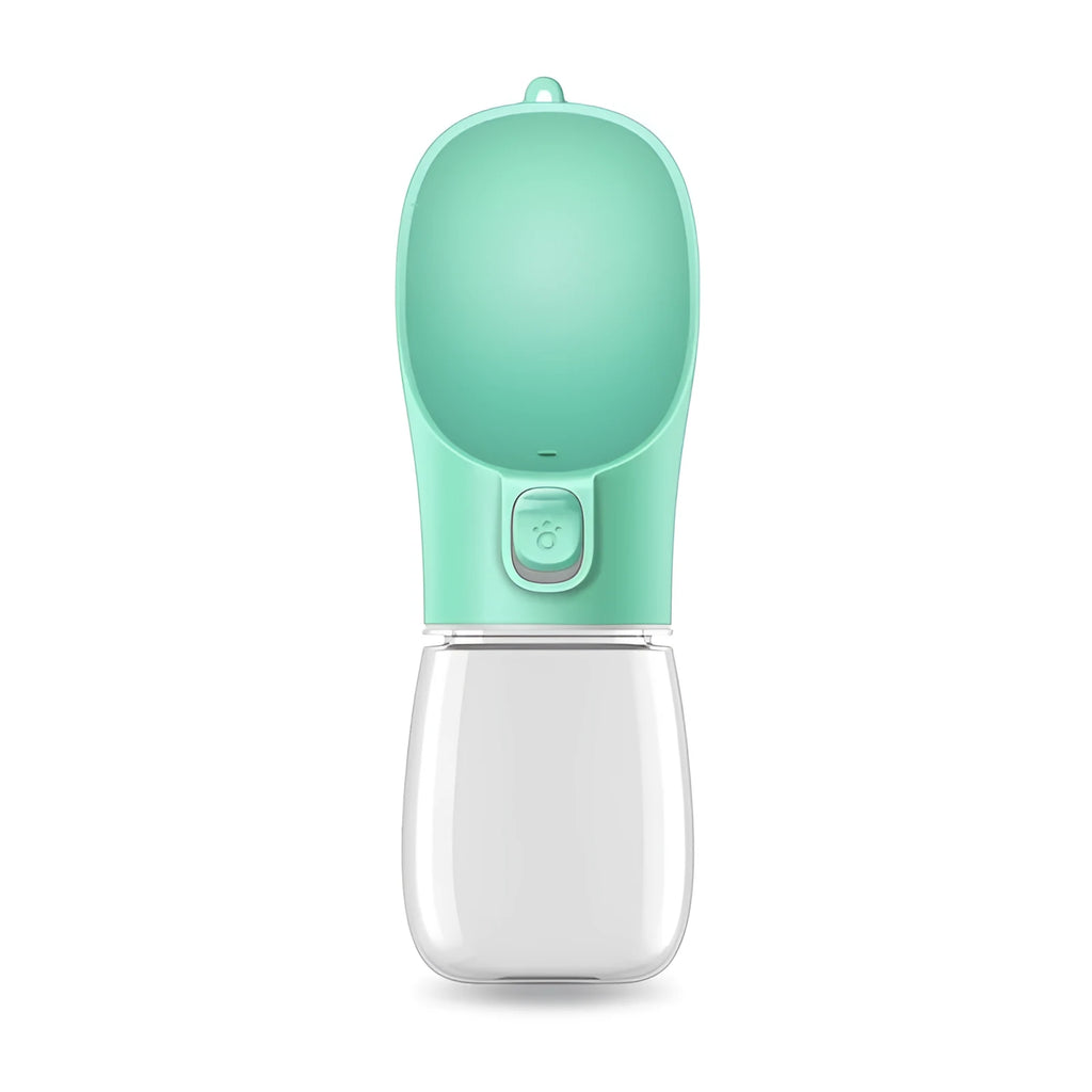 Portable plastic dog water cup in green and white with 380ml capacity and lid on grass
