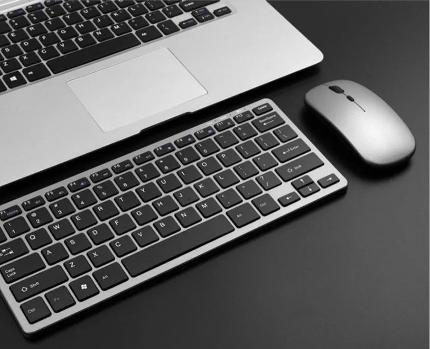 Wireless 2.4G charging silent keyboard mouse set in silver white with Bluetooth 3.0 78-key keyboard