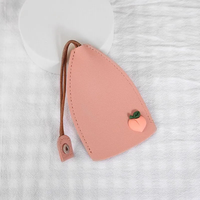 Cartoon pull-out car key case in PU leather with various design options including cactus, rabbit, and fruit themes