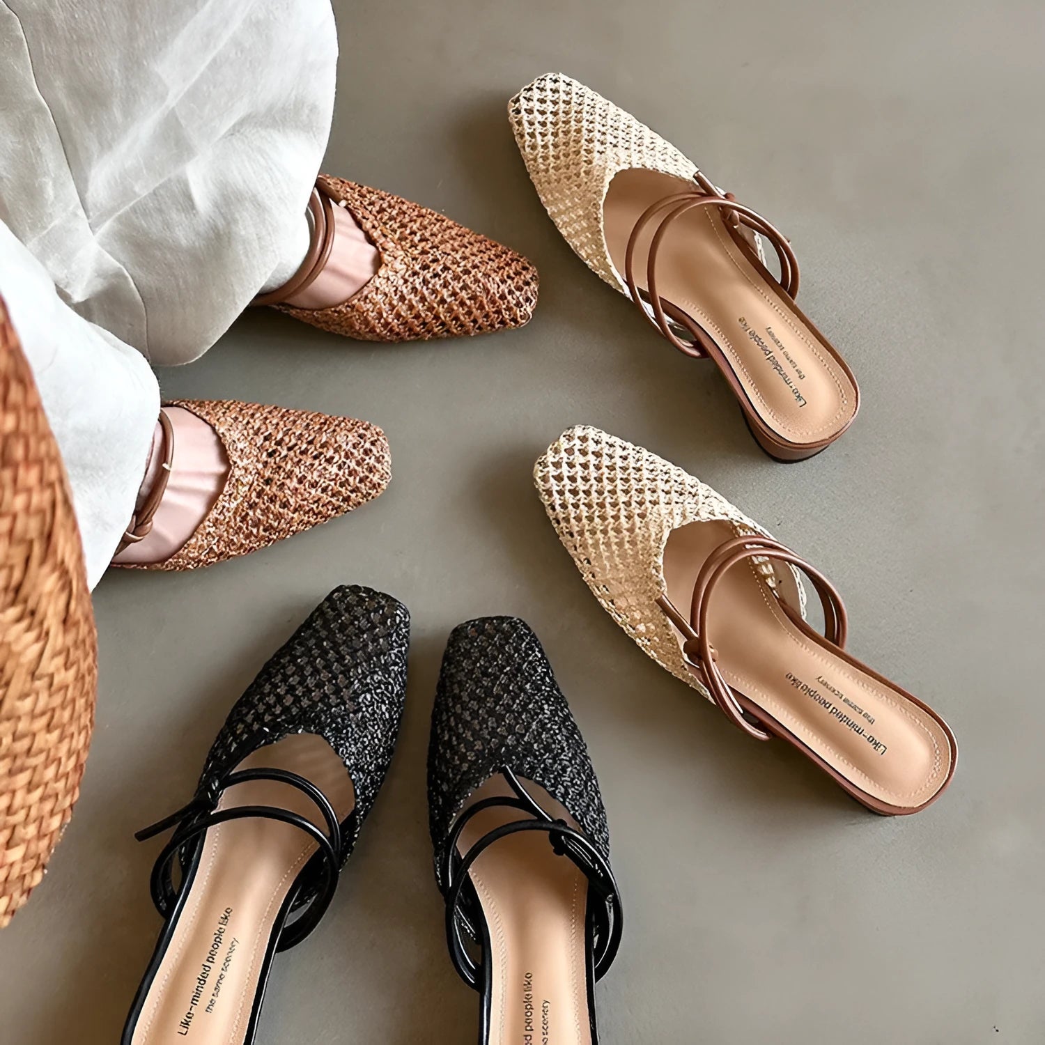 Women's black retro square toe slippers with chunky mid heel and breathable hollow-out PU upper.