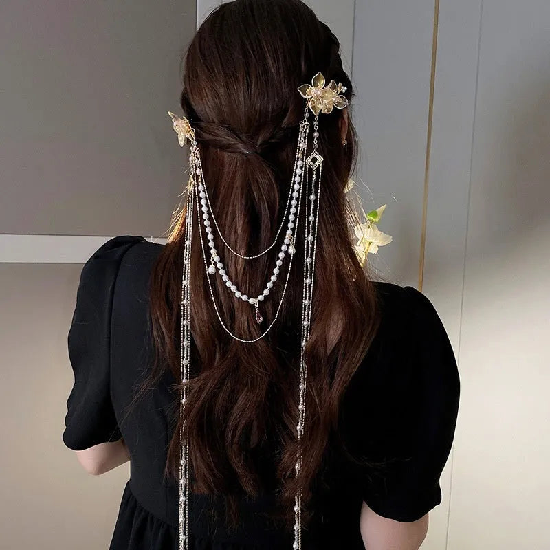 Gold-colour acrylic hairpin with pearl and diamond elements and long tassel design