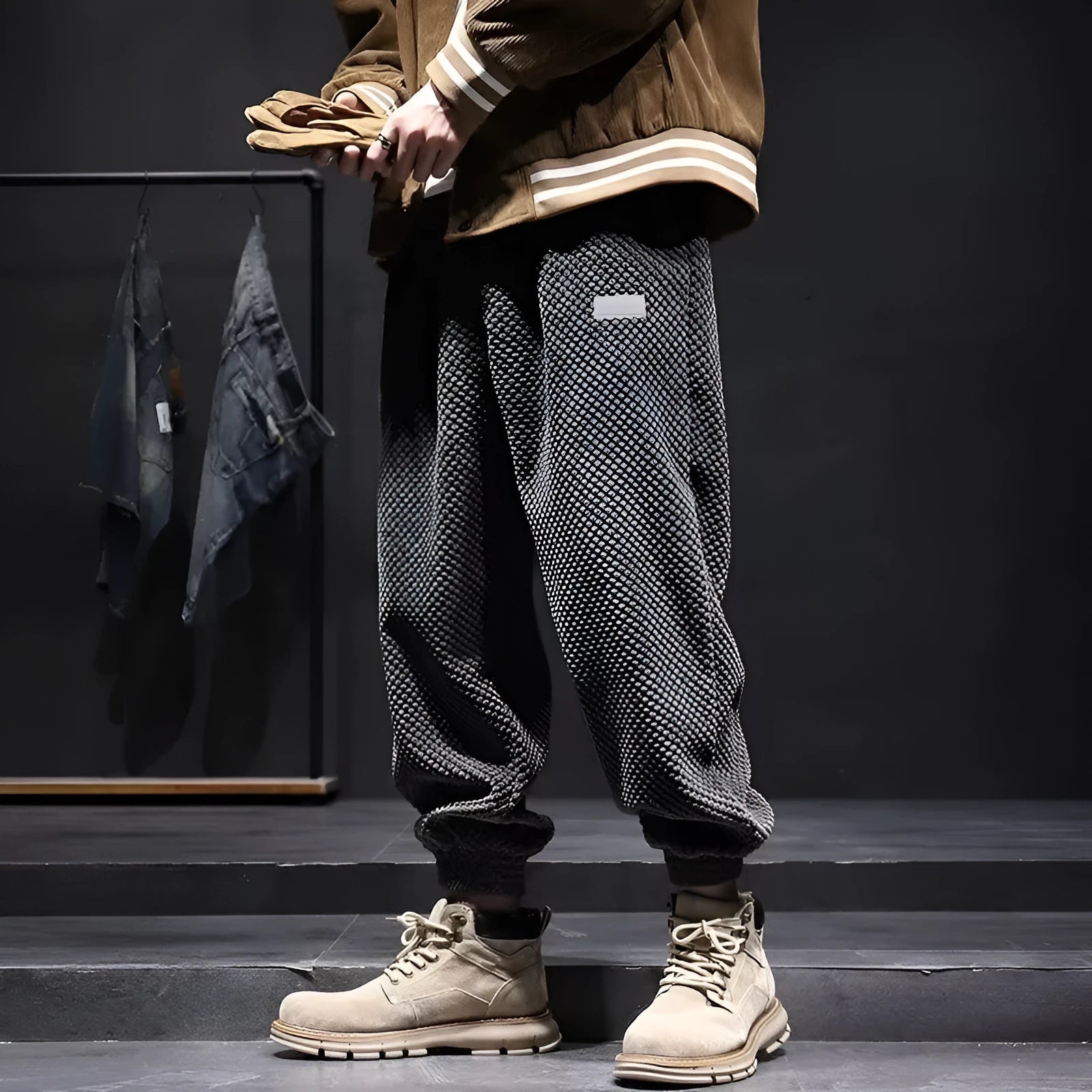 Men's grey casual sweatpants with ankle tie detail showing straight-leg silhouette