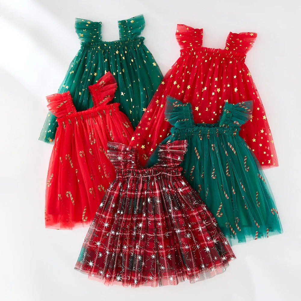 XINGX girls suspender skirt in Snowflake Red and Green colour, polyester fabric, side view