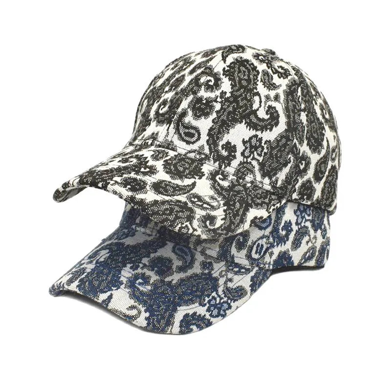 Polyester baseball cap with printed paisley pattern in blue, showing dome crown construction