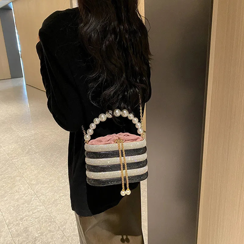 Women's retro style crossbody bag with pearl beading on soft PU material in round dinner bag shape