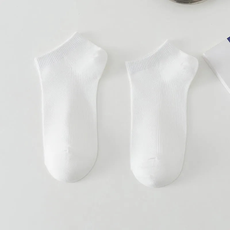 Men's solid colour polyester boat socks in low-cut design showing six colour variations