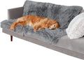 Dark grey plush waterproof dog cushion bed in a large size on a floor