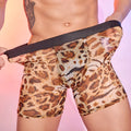 Men's leopard print nylon boxer shorts laid flat, showing the full animal pattern.
