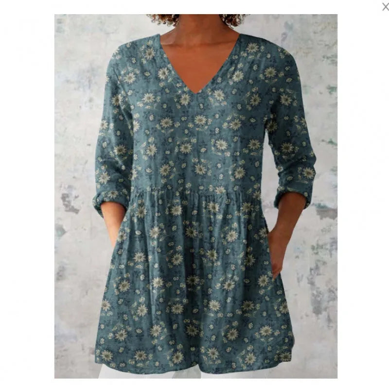 Women's printed loose dress with 3/4 sleeves and wide waist in colourful pattern