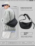 Men's large capacity nylon messenger bag in a solid colour for commuting.