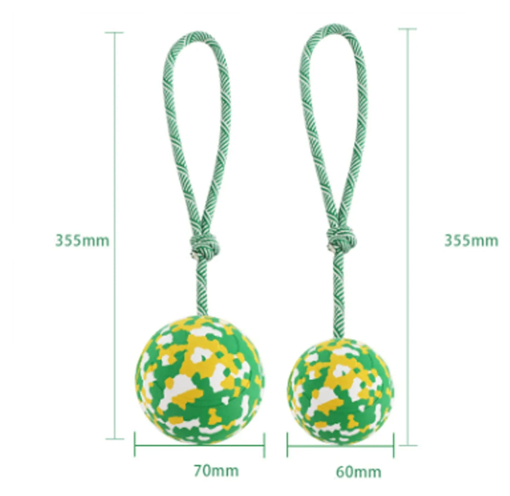 Natural rubber dog ball on nylon rope toy in L and S sizes for medium and small dogs