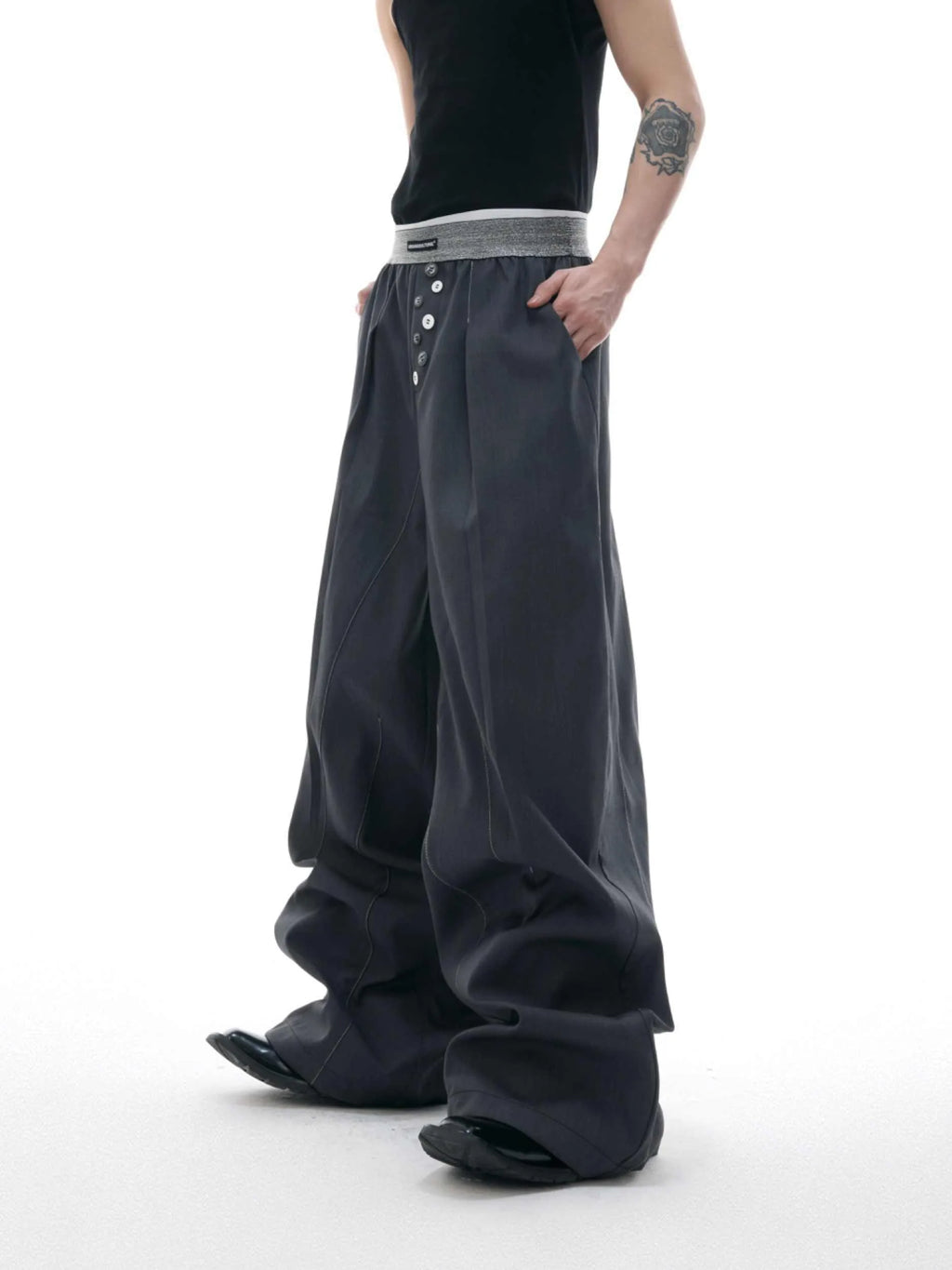 Straight-leg suit pants with button detail on leg in black or grey colour