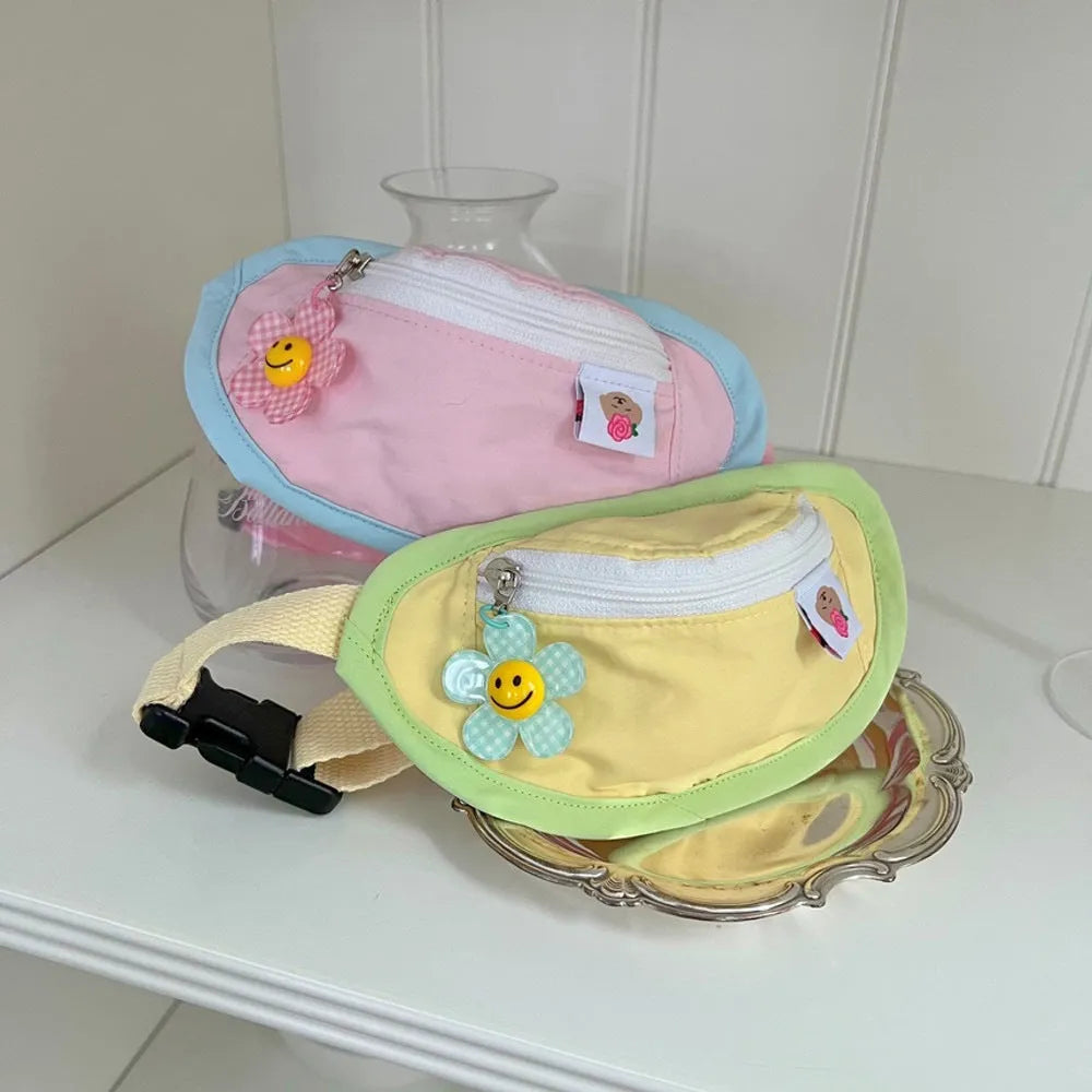 Pink or yellow backpack-style pet carrier for small dogs and cats with adjustable straps and attached poop bag holder.