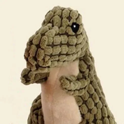 Four grey, green, and orange bite-resistant dog toys with sound features on a white background.