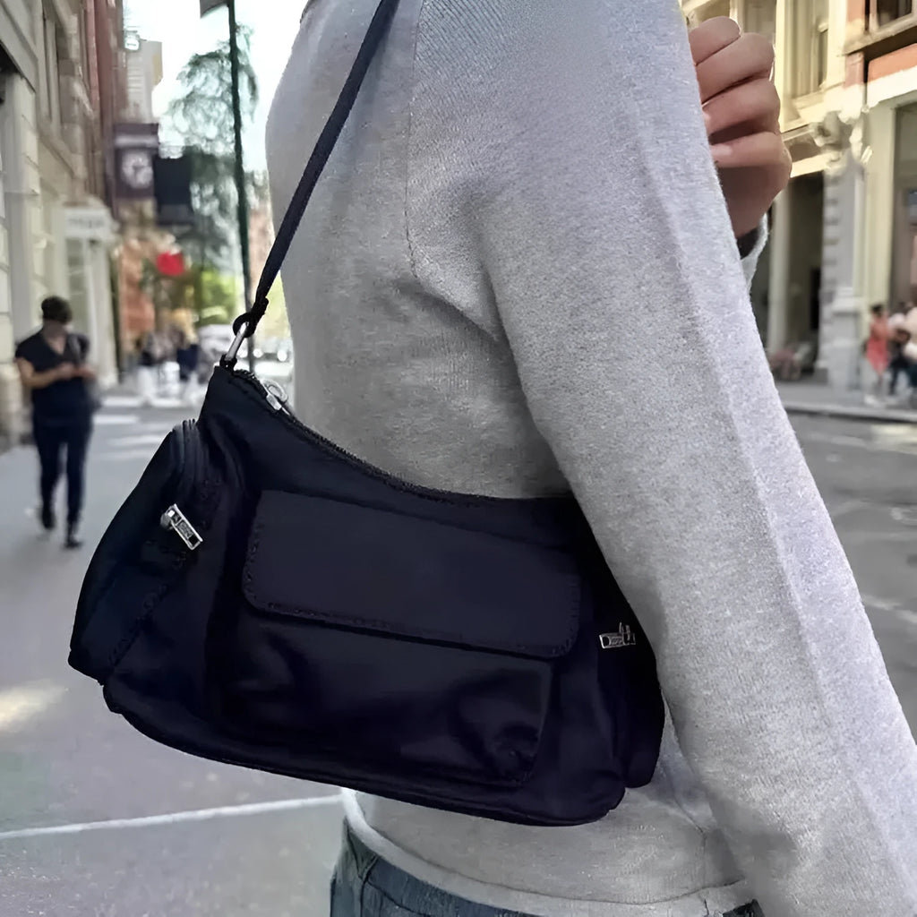 Black PU leather women's shoulder bag with double pockets and side line detailing