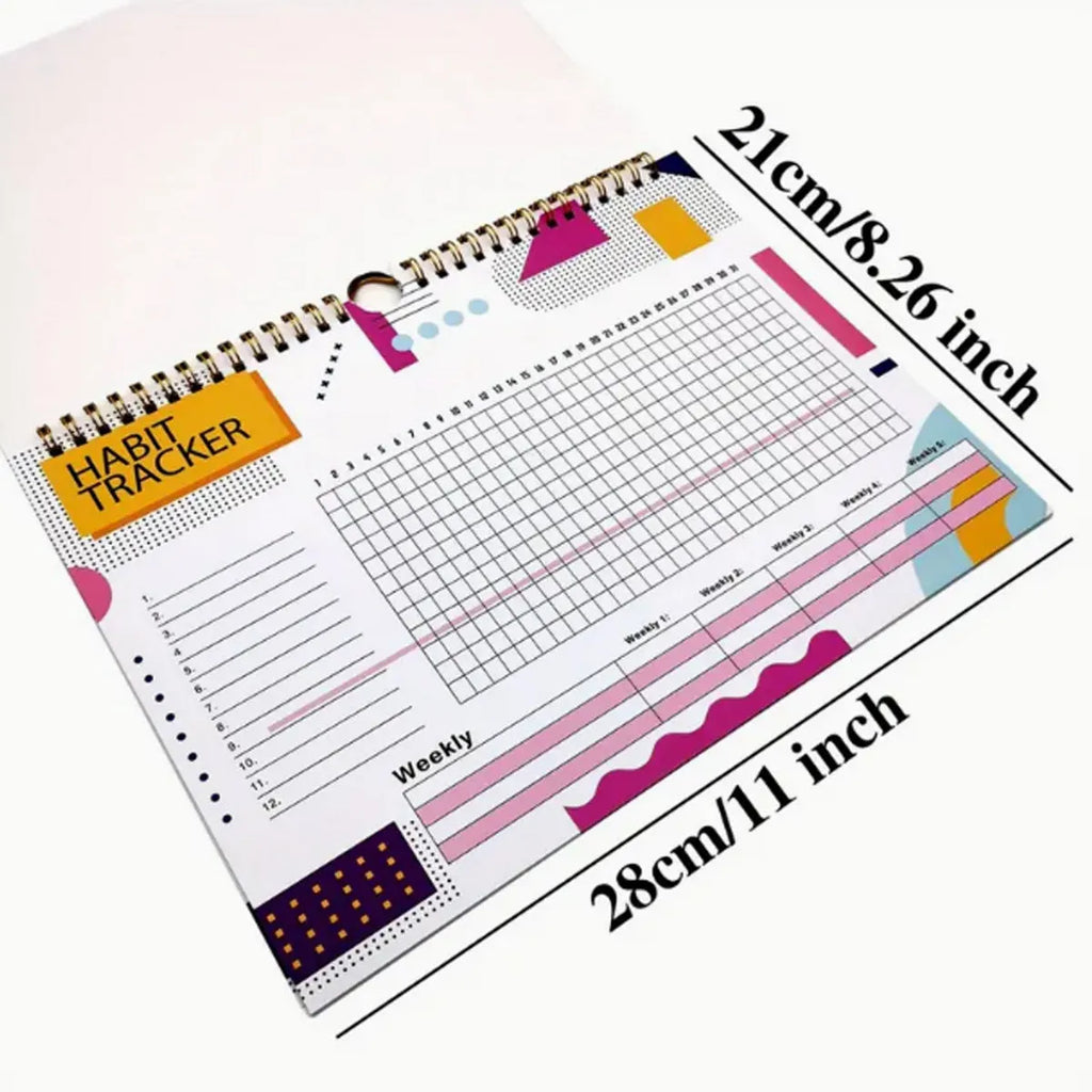 12-page habit tracking journal in pink and white, showing its 21cm by 28cm size.