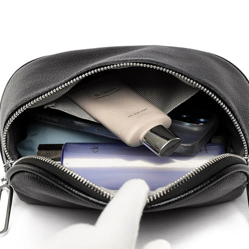 Women's soft PU leather messenger bag in saddle shape with cross-body strap and internal organisation