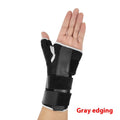 Carbon fibre sports wrist guard with thumb strap in black and grey