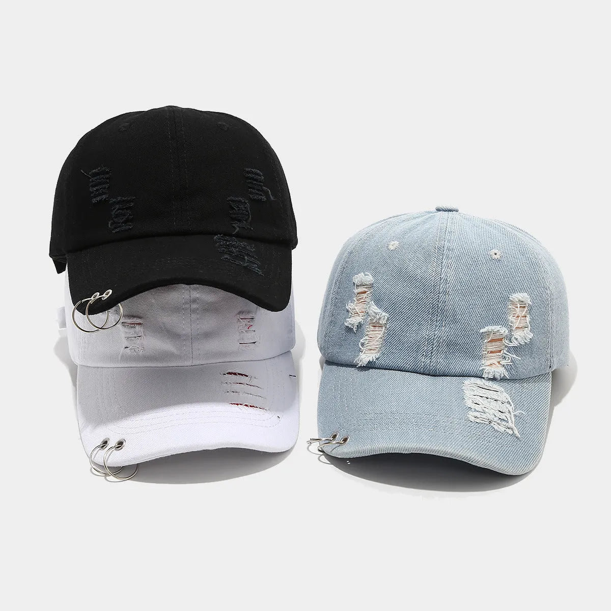 Men's adjustable denim peaked cap in black, white, and light blue jeans colours with dome crown
