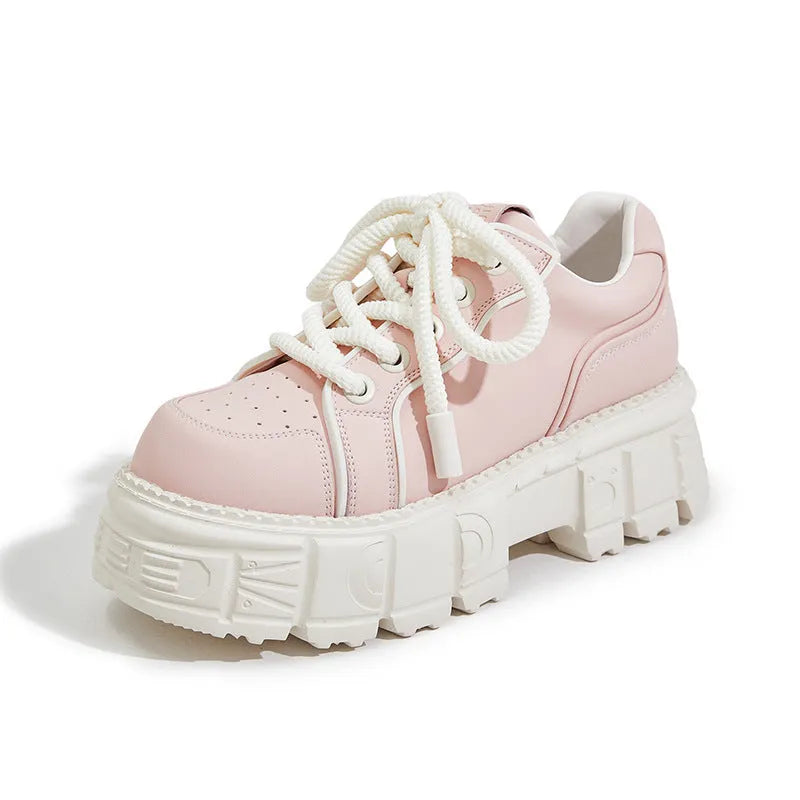 Women's beige casual leather shoes with a spring muffin heel on a rubber foam sole.