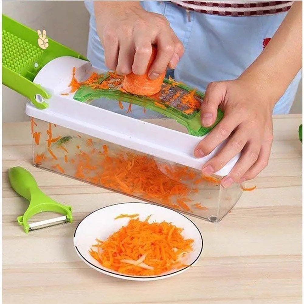 Green 12-piece manual vegetable chopper and food dicer set with stainless steel blades on a kitchen counter.