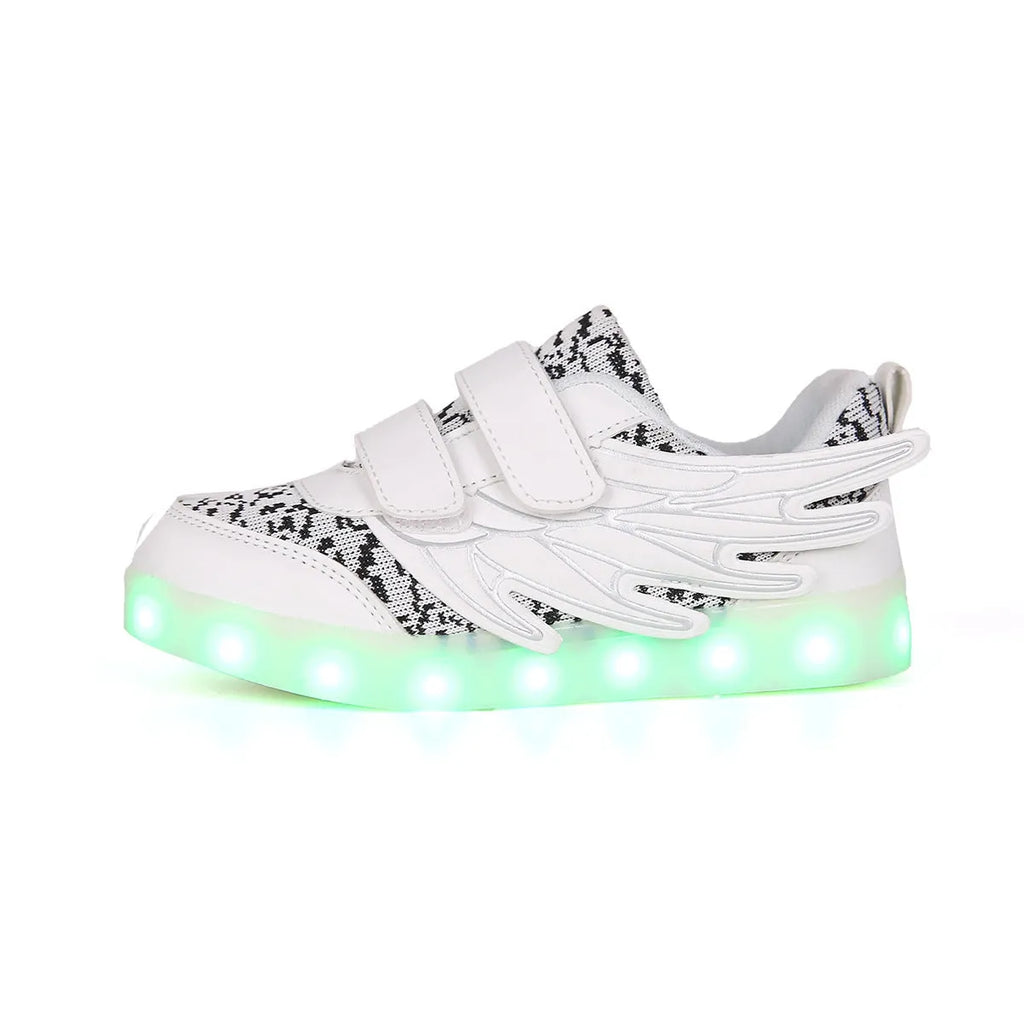 Plum red children's LED light-up sneakers on a white background, showing USB charging port.