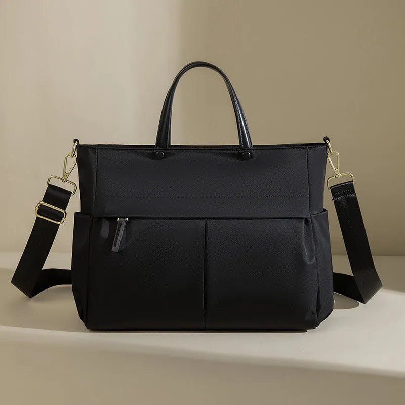Women's Oxford cloth briefcase bag in elegant black with contrast colour detailing and stitching