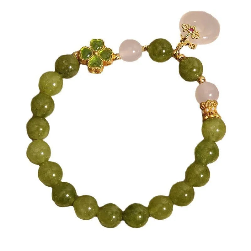 Green tourmaline four leaf clover women's bracelet with safety buckle, peace buckle, and lucky bag charm in New Chinese style.