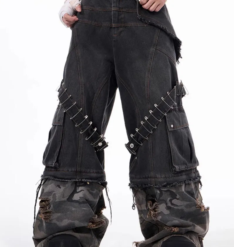 Grey men's camouflage jeans with splicing construction and pin details on cotton denim fabric